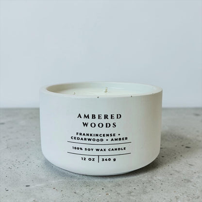 Ambered Woods scented soy wax candle with frankincense, cedarwood and amber notes. Handmade concrete candle, luxury home fragrance, Christian gift for women and faith-inspired home decor.