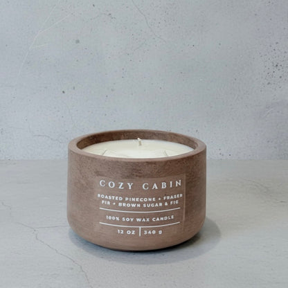 Cozy Cabin Christian soy wax candle with Fraser fir, roasted pinecone, and brown sugar fig fragrance in a handcrafted concrete vessel. Faith-inspired home décor by Boswellia Candle Co.