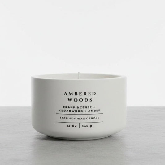 Ambered Woods scented soy wax candle with frankincense, cedarwood and amber notes. Handmade concrete candle, luxury home fragrance, Christian gift for women and faith-inspired home decor.