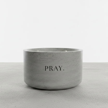 PRAY. faith-inspired 12 oz soy wax candle in a handcrafted gray concrete vessel, designed as a daily reminder to pause, pray, and trust in God.