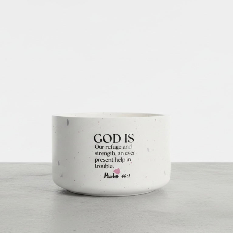 Aurora Petals floral soy wax candle with Psalm 46:1 Bible verse, handcrafted in a white terrazzo concrete vessel and scented with freesia, lilac, and jasmine.